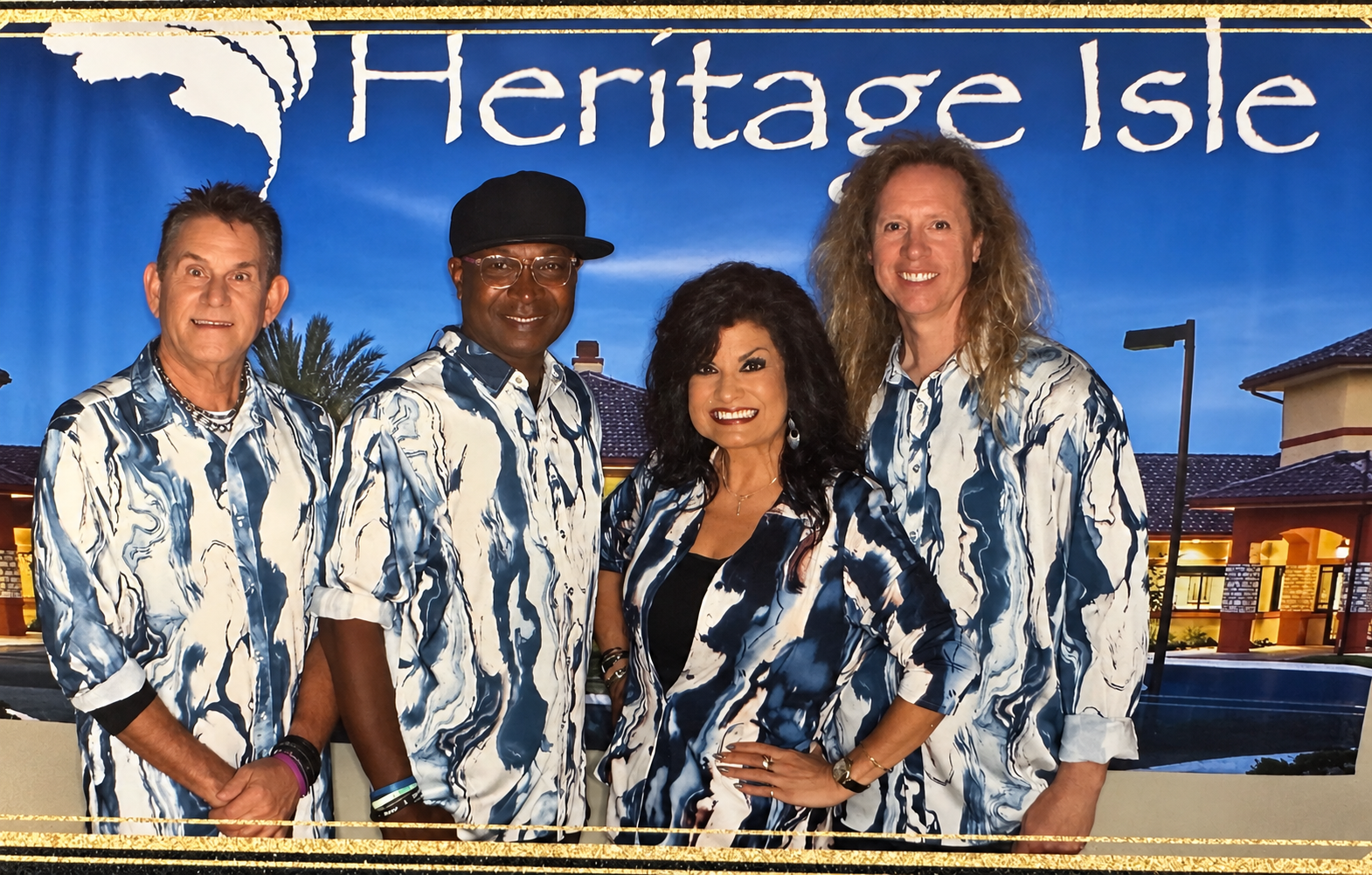 SWITCH featuring Ana posing together in matching shirts at Heritage Isle