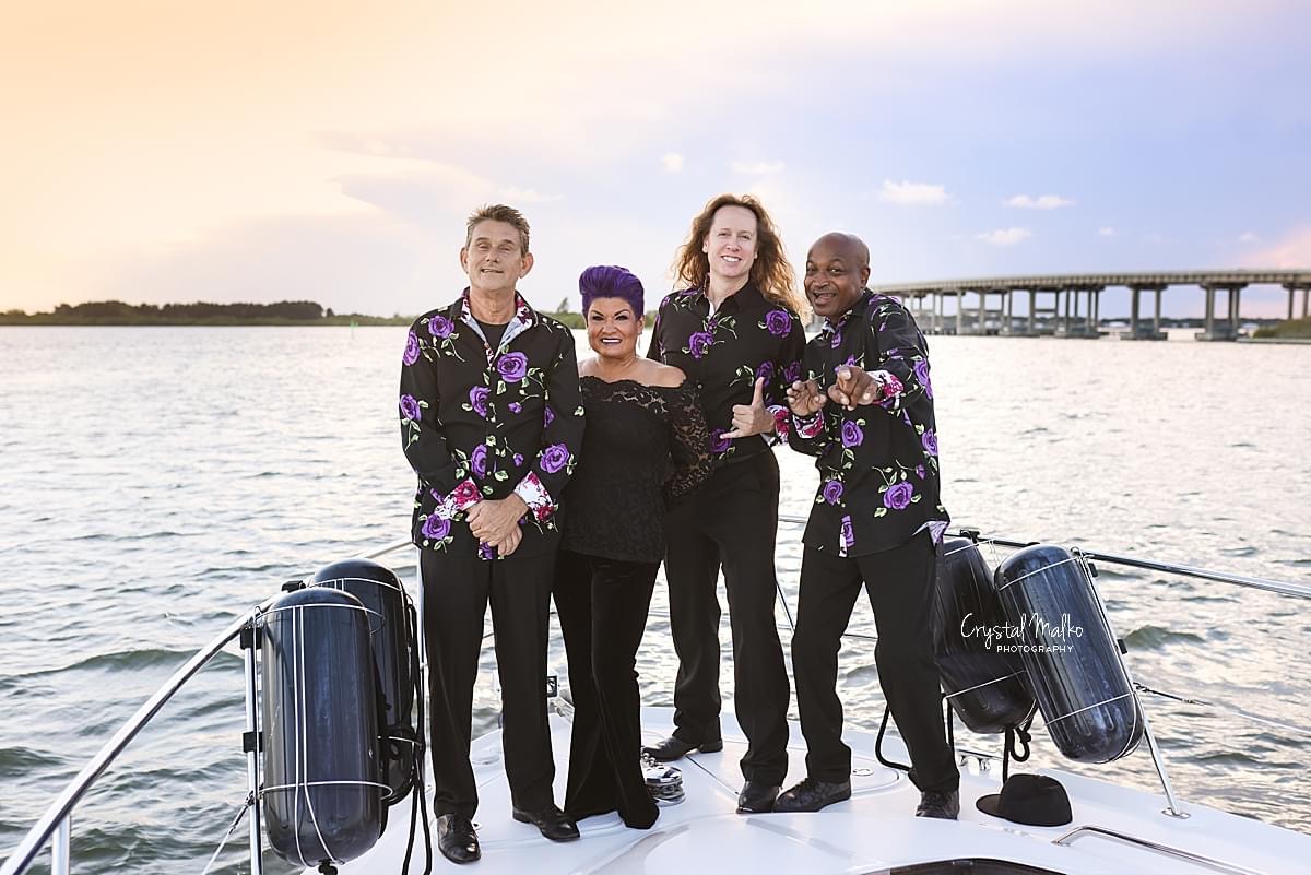 SWITCH featuring Ana together on a boat at sunset
